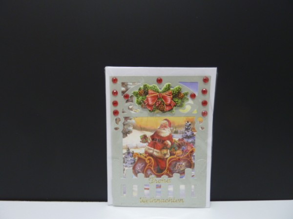 Handgearbeitete 3-D Weihnachtskarte mit Motiv "Weihnachtsmann mit Schlitten"